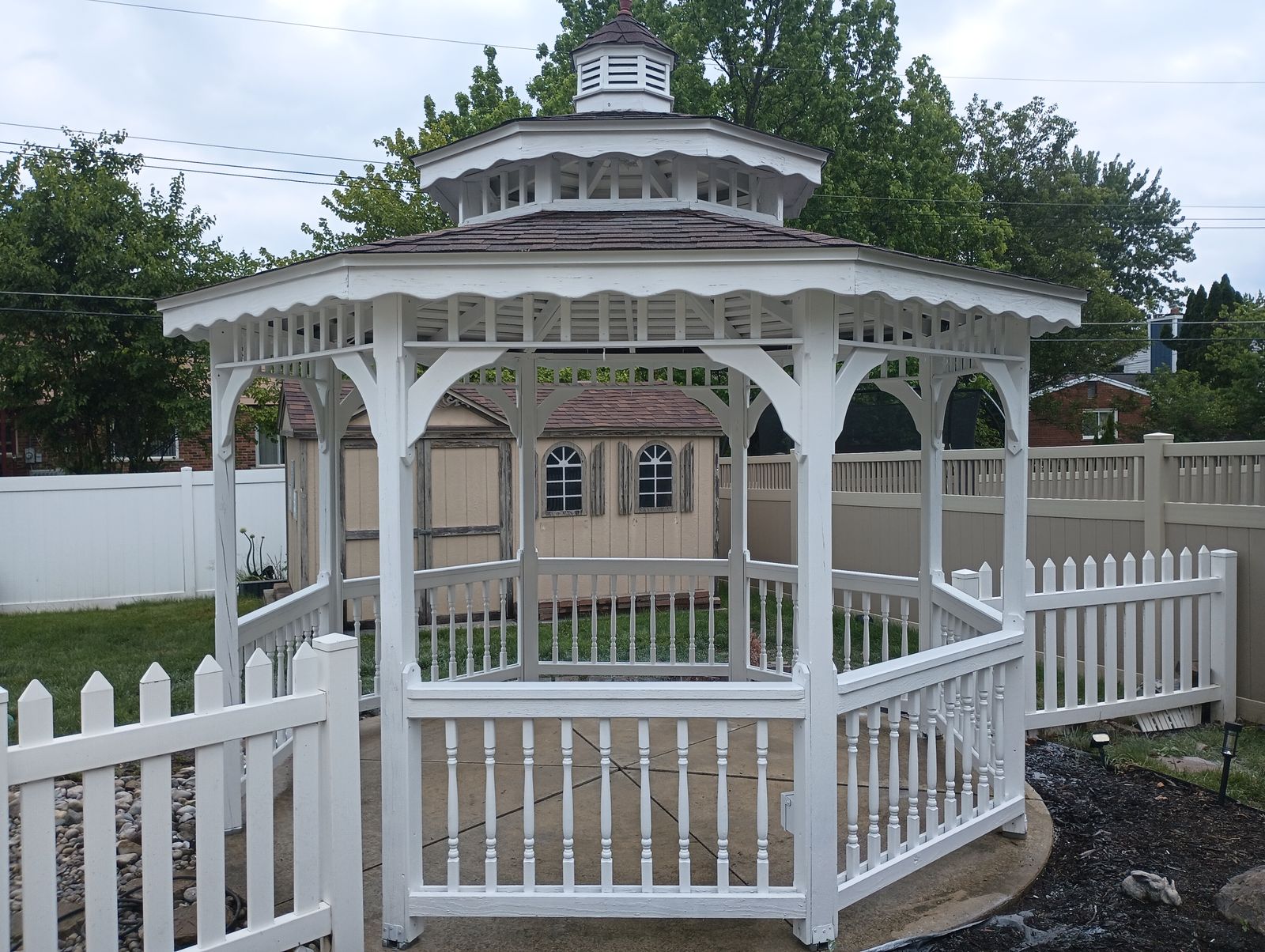Finished gazebo exterior, side view, overcast day