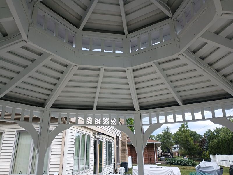Freshly painted white gazebo ceiling rafters, second angle