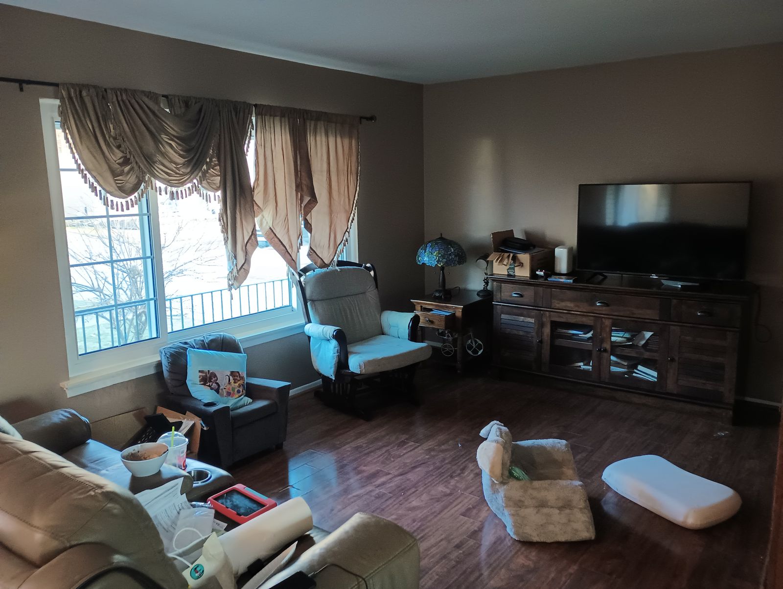Living room after repaint, second angle, warm brown walls